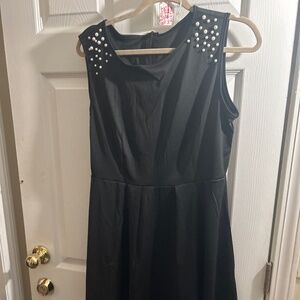 83) sheen black dress with pearls size large has a airline dress very cute